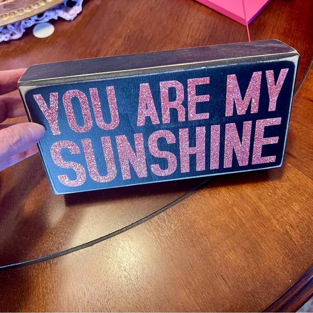 Cute black plaque with pink lettering